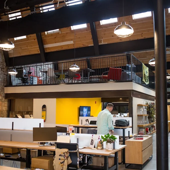 Truth collective main workspace, computers, loft