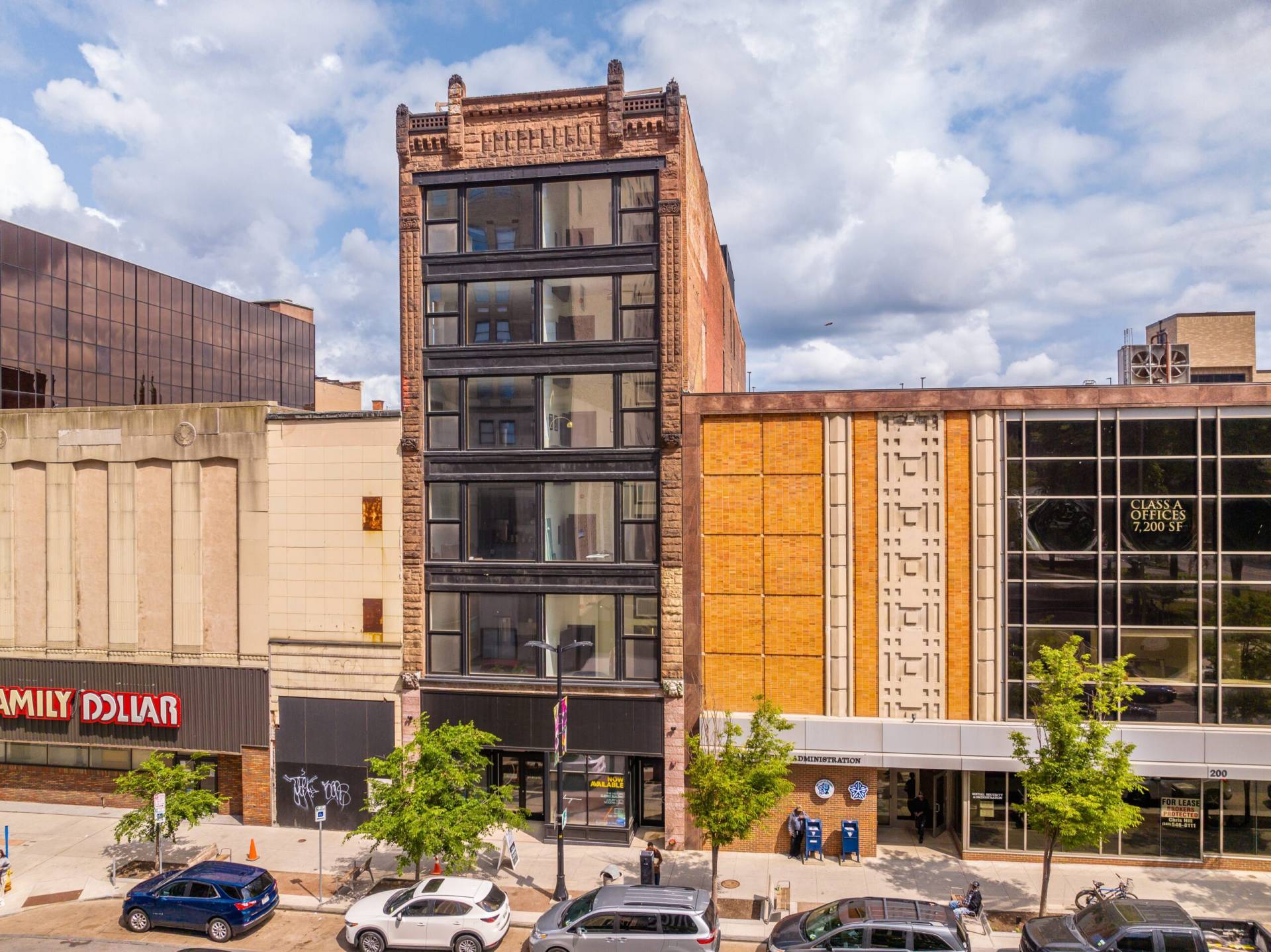 Front vertical exterior facade of glenny building from across the street